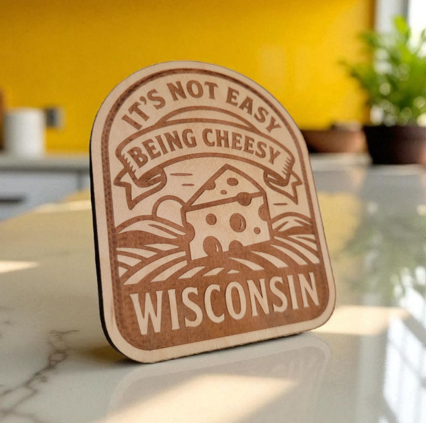 Wood magnet engraved with a wedge of cheese and the phrase “It’s Not Easy Being Cheesy – Wisconsin.”