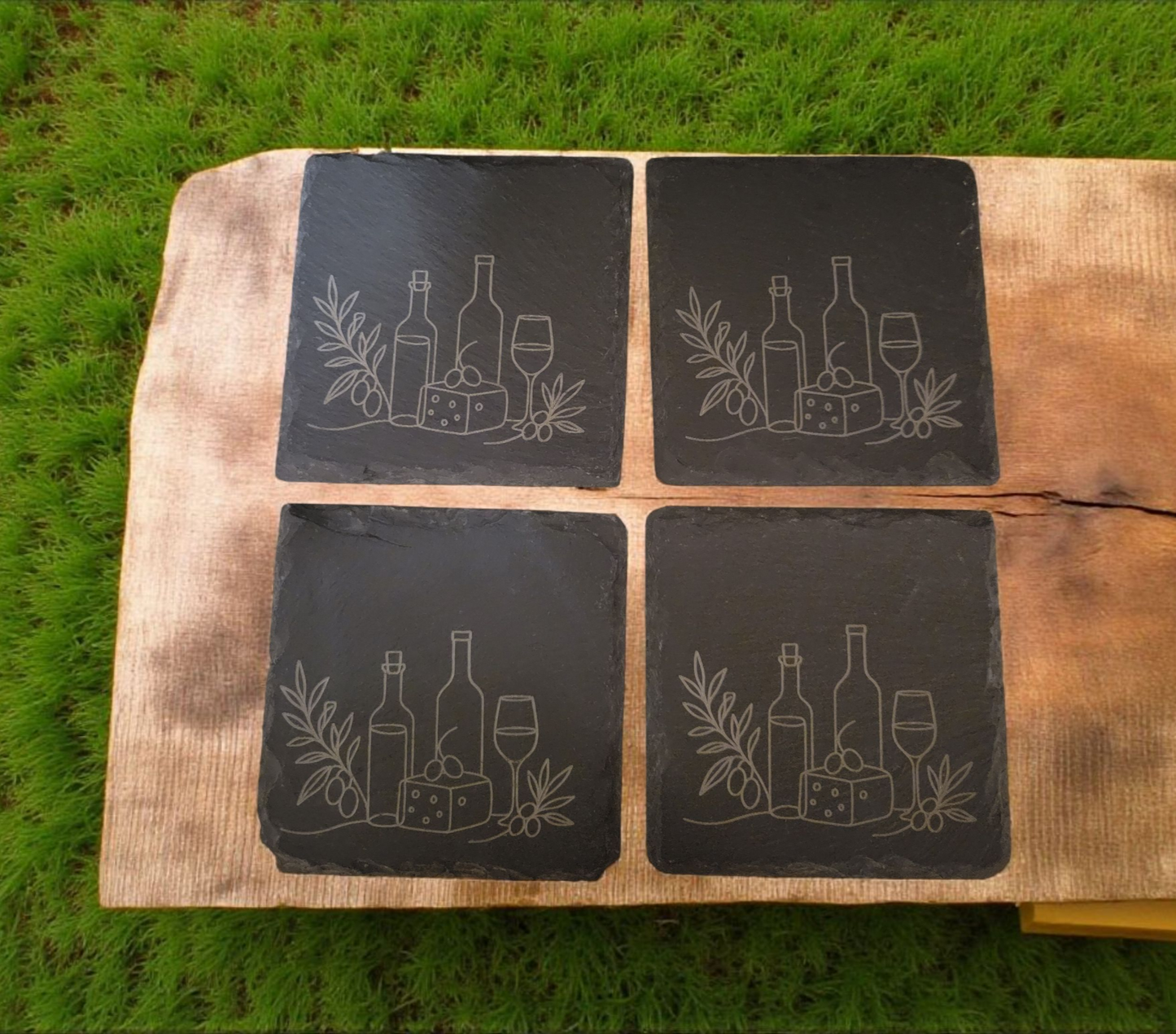 Rustic set of 4 square slate coasters, laser engraved with olive branch sprigs or a wine-and-cheese scene. Natural slate stone with etched line art design, perfect for protecting tables in style.