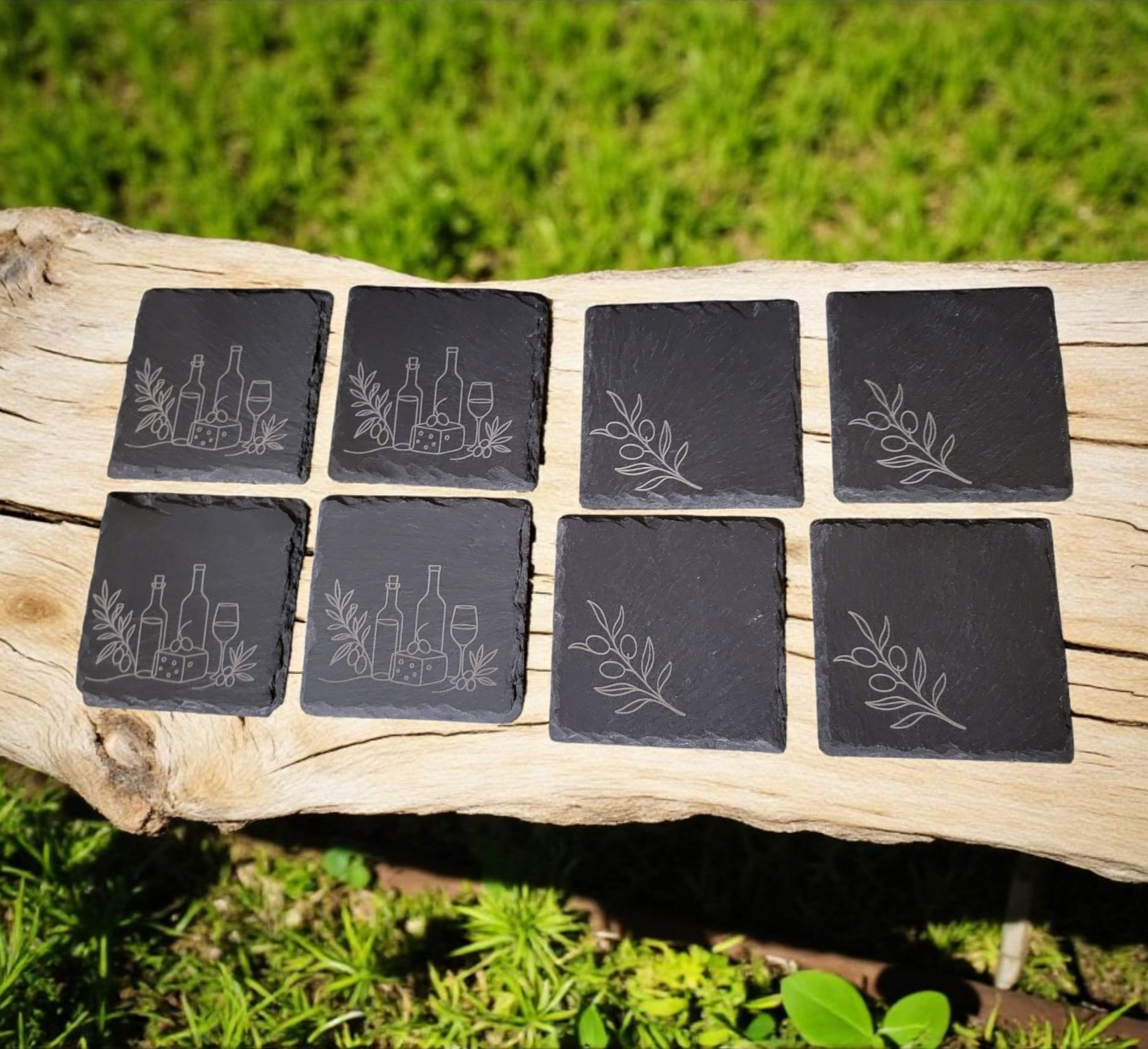 Rustic set of 4 square slate coasters, laser engraved with olive branch sprigs or a wine-and-cheese scene. Natural slate stone with etched line art design, perfect for protecting tables in style.