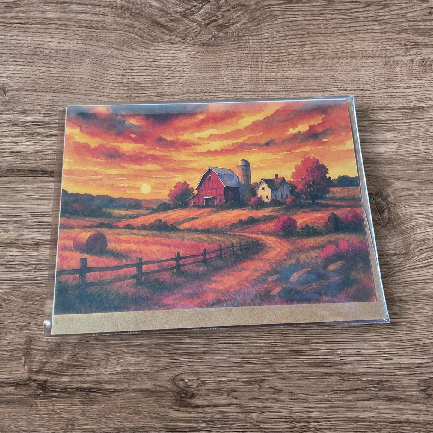 Rustic Midwest landscape card with barn and hayfield illustration.