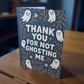 Greeting card reading ‘Thank You For Not Ghosting Me’ with cute ghosts and floral accents.