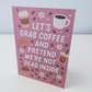 Greeting card reading ‘Let’s Grab Coffee and Pretend We’re Not Dead Inside’ with coffee and pastry illustrations.