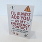 Greeting card reading ‘I’ll Always Add You As My Emergency Contact Even Though You’re A Little Sketchy’ with playful icons.