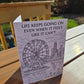 Black-and-white greeting card reading ‘Life Keeps Going On Even When It Feels Like It Can’t’ featuring a ferris wheel and city skyline.
