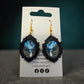 Ghost dangle earrings with original Ellie Joe Design Co. moonlit forest artwork and ornate black frames