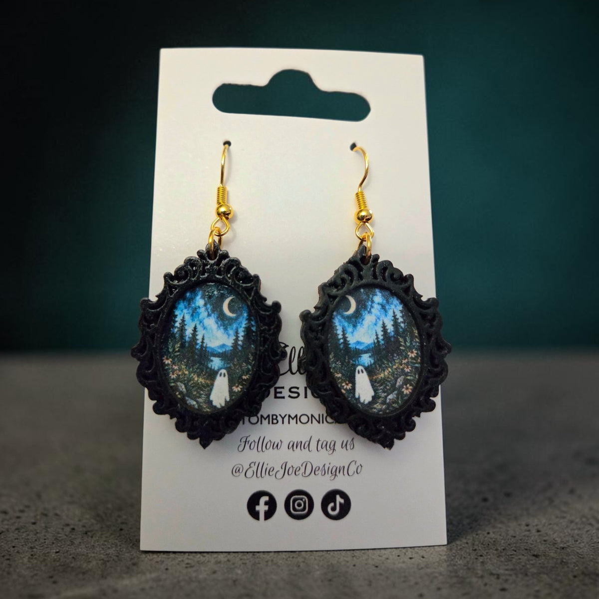Ghost dangle earrings with original Ellie Joe Design Co. moonlit forest artwork and ornate black frames