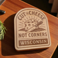 Wood magnet engraved with cheese wedge, knife, and the phrase “Cut the Cheese, Not Corners – Wisconsin.”