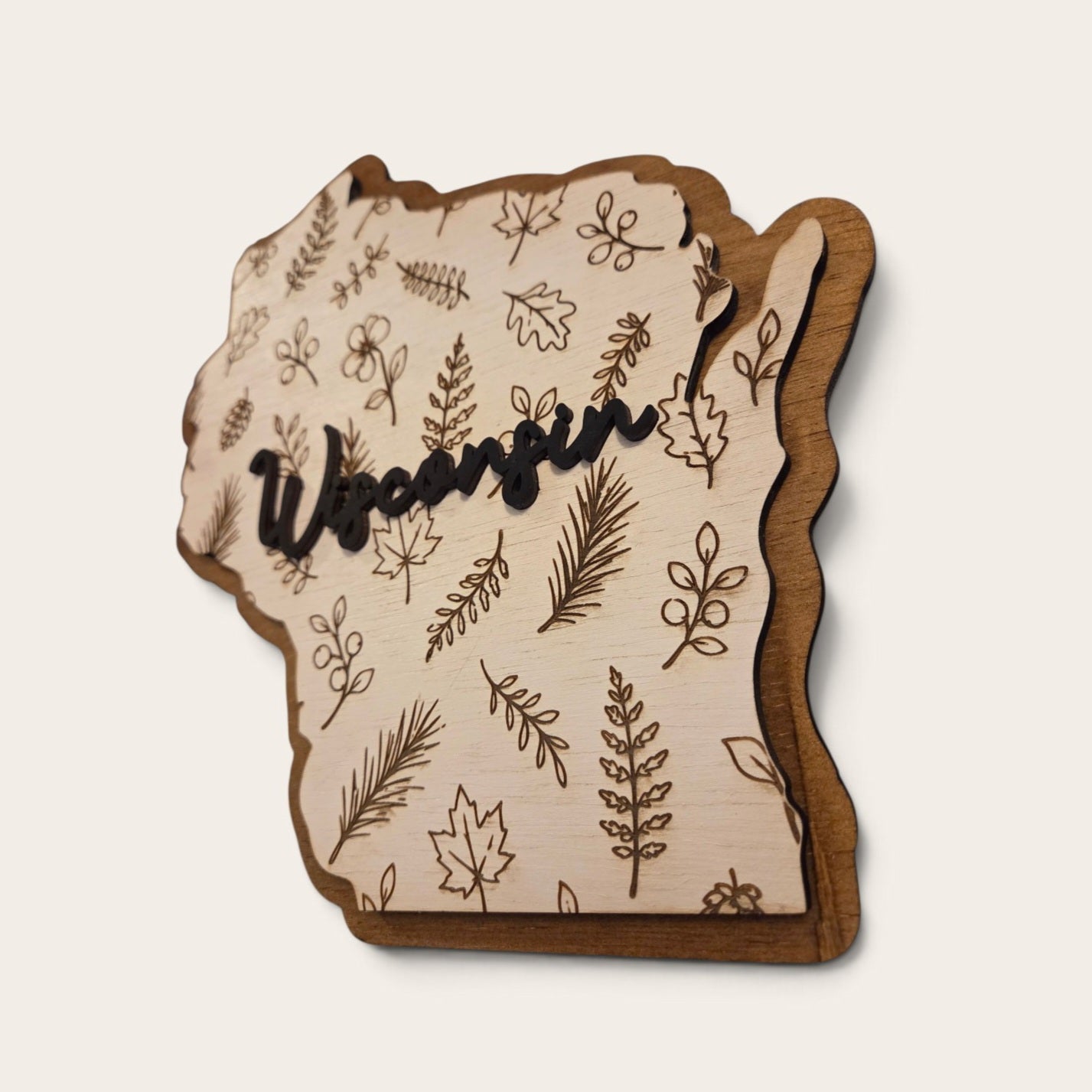 Wisconsin botanical two-layer wood sign with engraved leaves and raised Wisconsin lettering