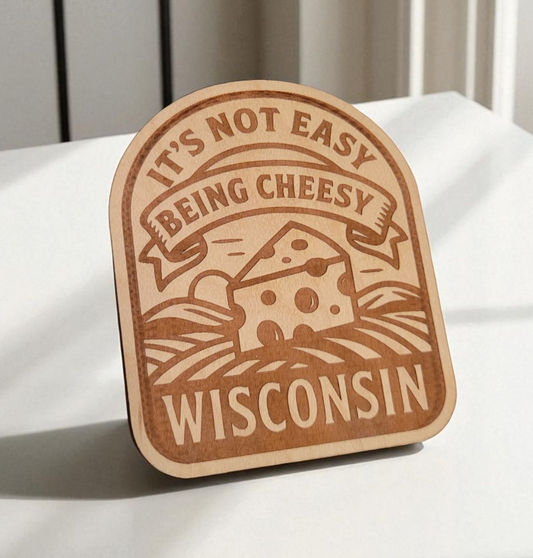 Wood magnet engraved with a wedge of cheese and the phrase “It’s Not Easy Being Cheesy – Wisconsin.”