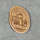 Wood magnet engraved with “Classroom Fueled by Coffee & Kindness,” featuring a coffee tumbler, books, apple, and classroom items