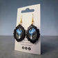 Ghost dangle earrings with original Ellie Joe Design Co. moonlit forest artwork and ornate black frames