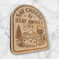 Close-up of engraved Wisconsin cheese and wine magnet on natural maple wood – handcrafted fridge magnet gift
